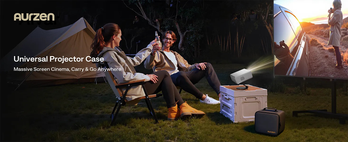 Couple enjoying outdoor movie night with Aurzen portable projector and carrying case set up for camping.