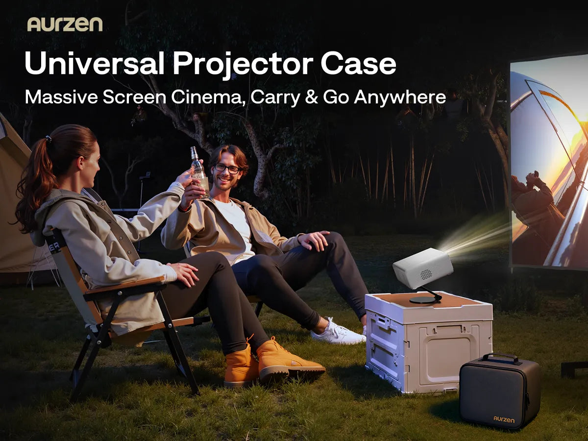 Couple enjoying outdoor movie night with Aurzen portable projector and carrying case set up for camping.