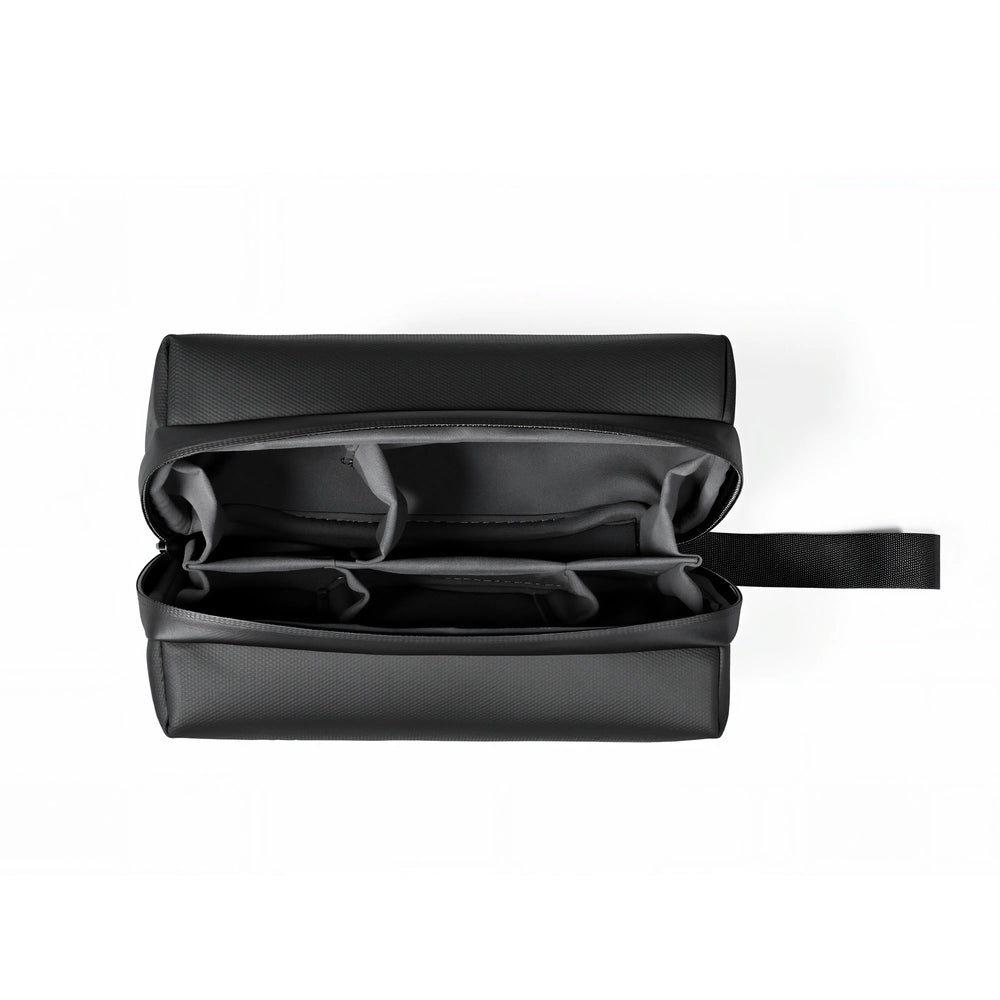 Black open projector case with padded interior and zipper flap