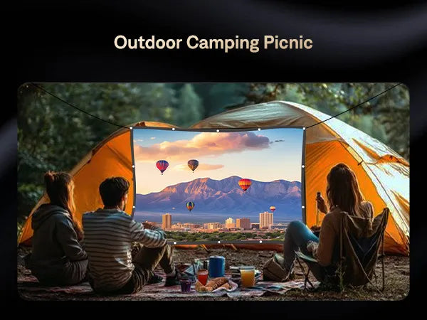 Outdoor Camping and Picnic Viewing - Image showcasing the projector screen set up outdoors at a campsite, with friends enjoying a movie night under the stars.