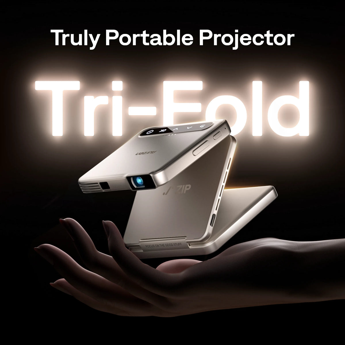Aurzen ZIP portable mini projector in silver resting on open hands