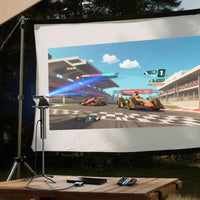 Aurzen CastPlay Pro USB-C wireless adapter used for outdoor projection and gaming experience