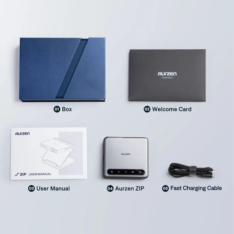 Aurzen ZIP Tri-Fold Portable Mini Projector unboxing — includes box, welcome card, user manual, fast charging cable, and projector unit.